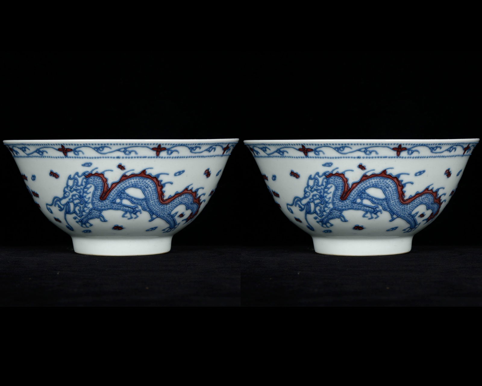 A Pair of Exquisite Paste relief Blue and White Underglaze-Red Dragon and Phoenix Pattern Bowls (1 of 9)