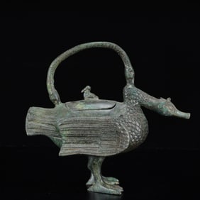 An Archaic Bronze Crane Ewer