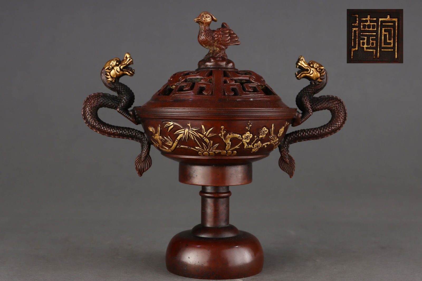 Gilt Red Copper Flower Pattern Dragon-Ears Censer: A Rare Gilt Red Copper Flower Pattern Dragon-Ears Censer,Ming Dynasty, China,With Mark,Size:5in(Caliber)x8.1in(Height),Weight:2350g 紫铜鎏金花卉纹龙 