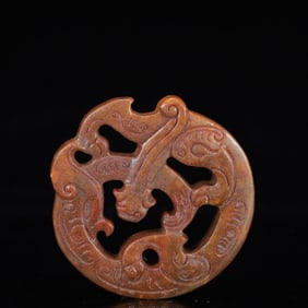 A Rare Gaogu yu Auspicious Beast Pendant