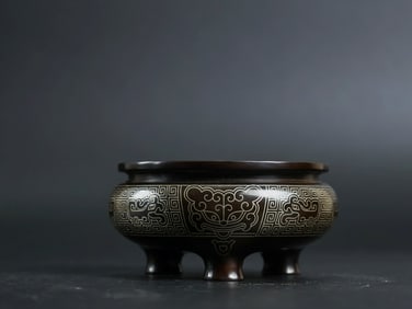 An Exquisite Bronze Inlaid Silver Beast-Face Pattern Tripod Censer