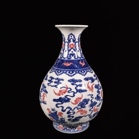 An Exquisite Blue and White Underglaze-Red Auspicious Cloud Pattern Vase