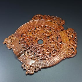 An Exquisite White Jade Dragon Pendant