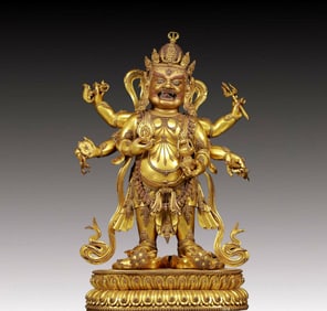A solemn gilt bronze Vajra statue