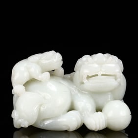 An Exquisite White Jade Auspicious Beast Ornament