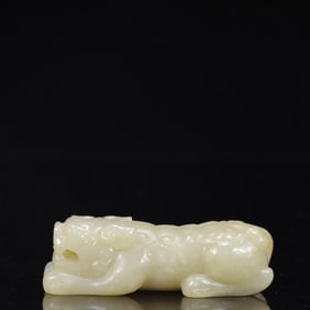 An Exquisite White Jade Auspicious Beast Ornament