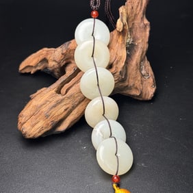 An Exquisite White Jade Pendant