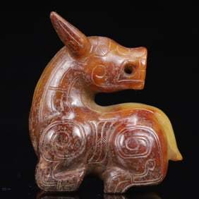 An Exquisite White Jade Auspicious Beast Ornament