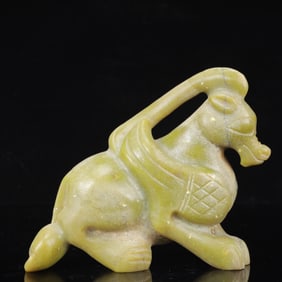 An Archaic Hongshan Culture Yellow Jade Animal Ornament