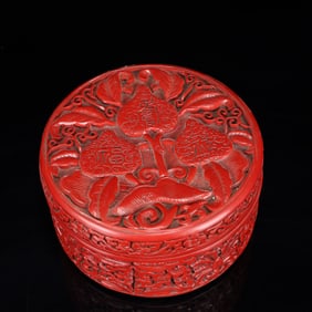 An Exquisite Carved Red Lacquer Flower and Peach Pattern Box with Cover