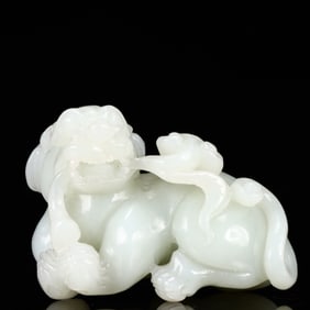 An Exquisite White Jade Lion Ornament