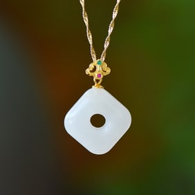 An Exquisite Sterling Silver-Gold Plated Inlaid White Jade Necklace