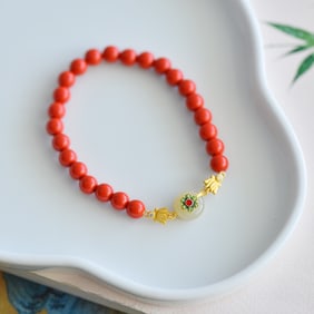 An Exquisite Sterling SilverInlaid Cinnabar Bracelet