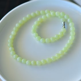 An Exquisite Sterling Silver Inlaid Greenish Jade Necklace