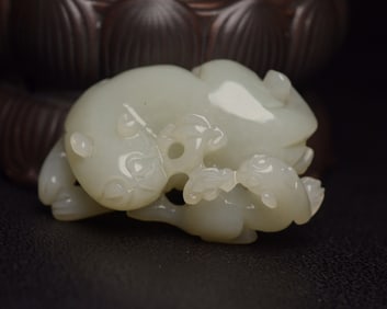 A Rare Hetian Jade Auspicious Beast Pendant