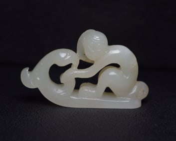 A Rare Hetian Jade Monkey-Shaped Pendant