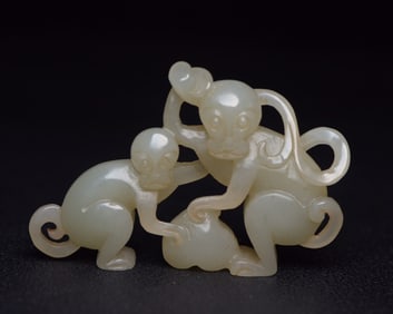 A Rare Hetian Jade Monkey-Shaped Pendant