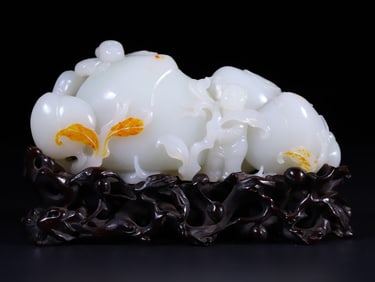 A Rare Hetian Jade Peach-shaped Ornament