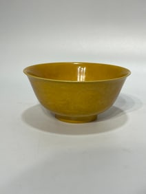A Rare Yellow Glazed Carved Hidden Dragon Pattern Bowl