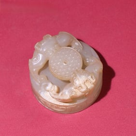 A Rare White Jade Chi Dragon Bi