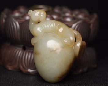 A Rare Hetian Jade Auspicious Beast Pendant