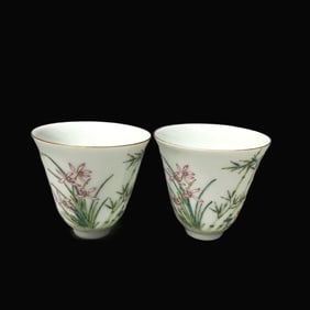 A pair of Famille-Rose Orchid Pattern Cup