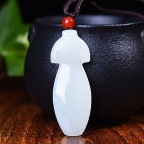 A Exquisite Hotan Jade Qipao-shaped Pendant