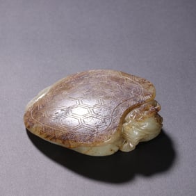 An Exquisite White Jade Auspicious Beast Pendant