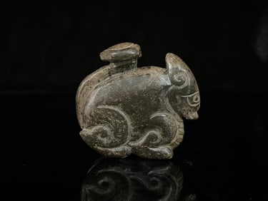 An Exquisite White Jade Auspicious Beast Ornament