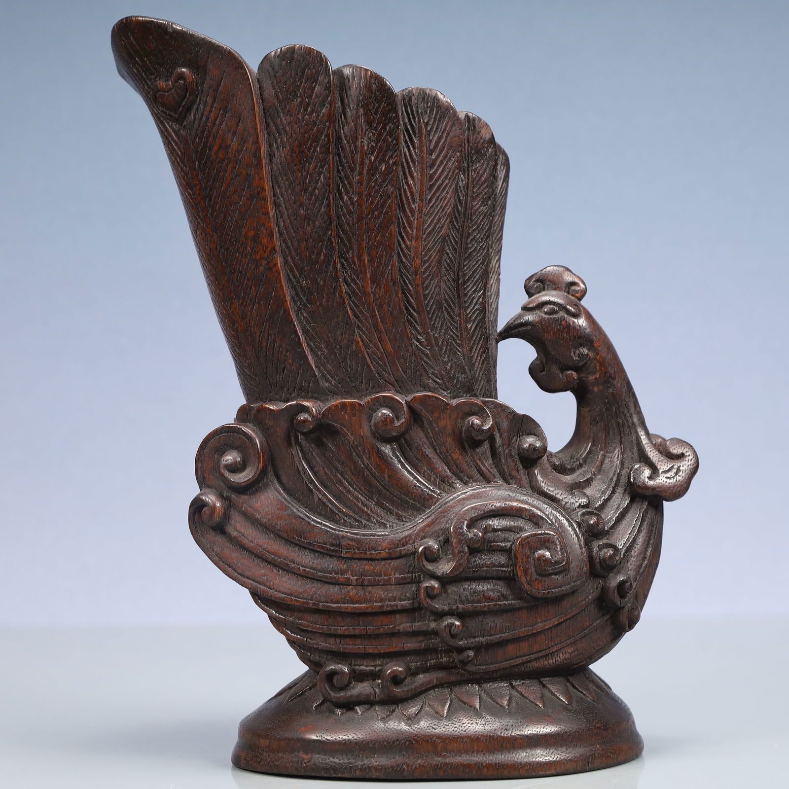 An Exquisite Eaglewood Flower Pattern Goblet: An Exquisite Eaglewood Flower Pattern Goblet Qing Dynasty, China Size:6.7inx4.7inx5.5in Weight:200g沉香木花卉纹爵杯 中国清代 Siz