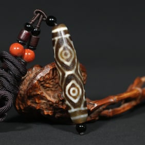 An Exquisite Agate Dzi Bead Pendant