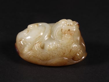 An Exquisite White Jade Auspicious Beast Ornament