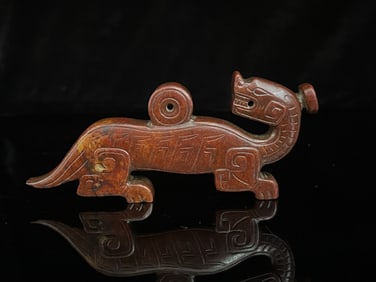 An Exquisite White Jade Auspicious Beast Ornament