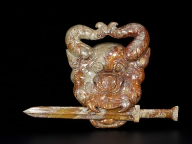 An Exquisite White Jade Beast-Face Pattern Ornament