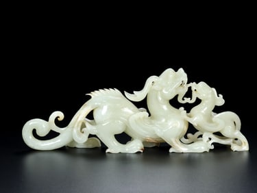 An Exquisite White Jade Auspicious Beast Ornament