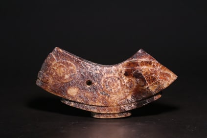 An Archaic Gaogu Jade Terminal Ornament