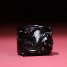 A Rare Black Jade Chi Dragon Ring