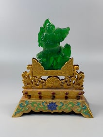A Rare Jadeite Ruyi Guanyin