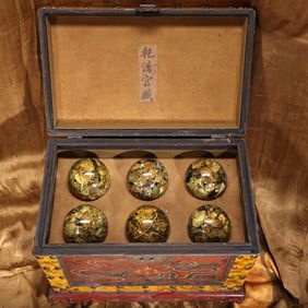 A Box of Rare Amber Raw Stone Balls