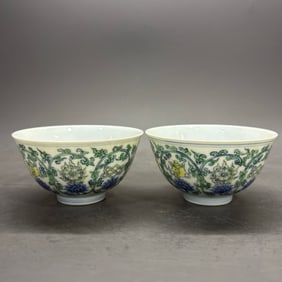 A pair of Rare Doucai Lotus Eight Treasures Pattern Cup
