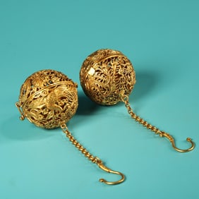 A pair of Rare Coppery Relief Hollow Gilded Hydrangea Sachets
