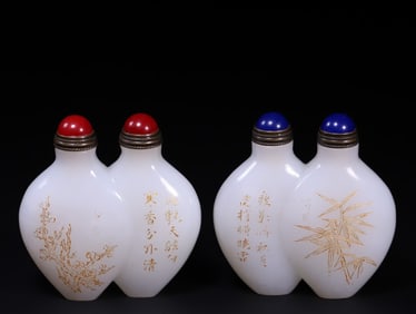 A pair of Rare Hetian Jade Plum-Blossom-Orchid-Bamboo Chrysanthemum-patterned Snuff Bottles