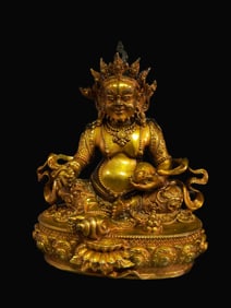 A Rare Gilt Bronze Yellow Jambhala