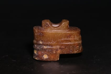 An Archaic Gaogu Jade Terminal Ornament