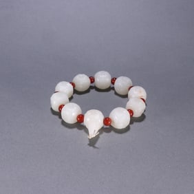 A Rare Hotan Jade Flower Pattern Bracelet