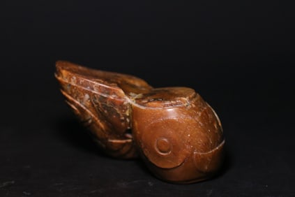 An Archaic Gaogu Jade Terminal Ornament