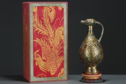 A Rare Gold and Silver-Inlaid Bronze Bronze Animal Head Ewer