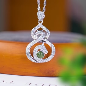 A Exquisite Silver Inlaid Jasper Dragon-Horse and Gourd-shaped Pendant
