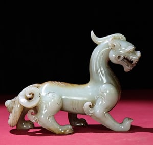 An Exquisite White Jade Auspicious Beast Ornament