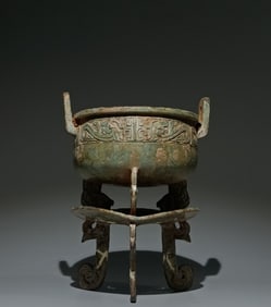 An Archaic Bronze Phoenix Pattern Double-Ears and Tripod Food Vessel